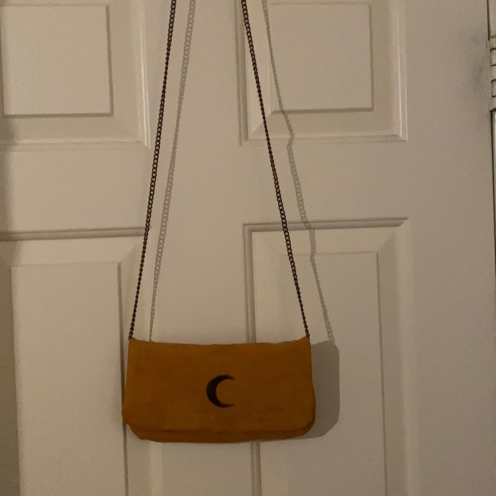 Francesca’s crescent moon handbag